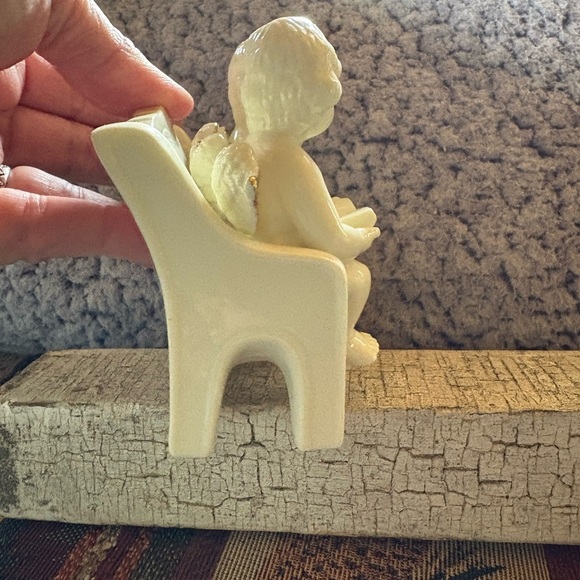 Vintage Porcelain Angel Figurine Two
Angels Sitting On a Bench - Picture 5 of 12